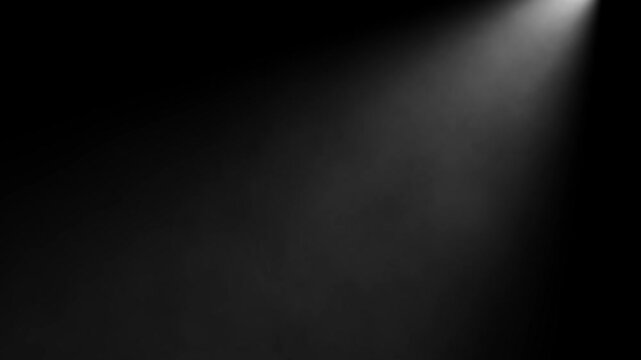 Dramatic Cinematic Spotlight Light Beam Moving Through Smoky Dark Room. Stage Lighting with Dust Particles Creating a Mystery Atmosphere on Black Background