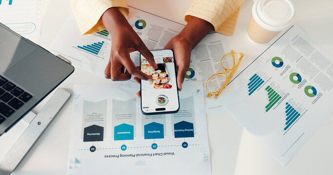 Ecommerce, above or hands in office with phone screen, sales analysis or food results on company website. Finance, graphs or woman in agency with tech, order platform or data insight for delivery app