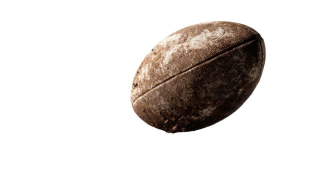 Dirty, oblong ball with seams, against a black background