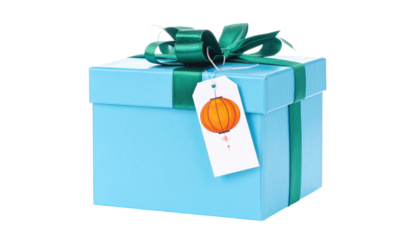 A square blue gift box, wrapped with green ribbon and bow, a tag with an orange lantern illustration hangs