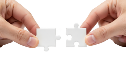 Two hands holding white puzzle pieces about to connect isolated on a transparent background jigsaw connection