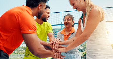 Padel, stack of hands and friends on court for fitness, workout or training together for match. Huddle, people and group of athletes with teamwork for exercise, sports or practice for game outdoor.