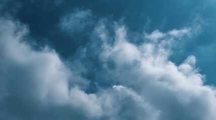 Vast blue sky filled with dramatic fluffy white clouds