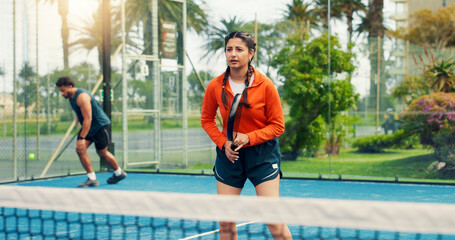 Woman, padel or waiting for serve on court with sports game, competition practice or fitness development. Agile, person or athlete outdoor with racket for tennis workout, tournament training or ready