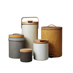 Group of textured canisters with wood lids against a black background