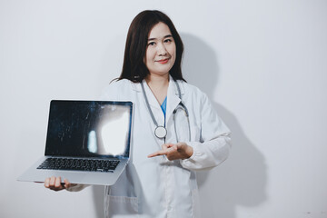 Female druggist standing with a digital tablet