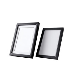 Two black frames with white mats, angled on a stark background