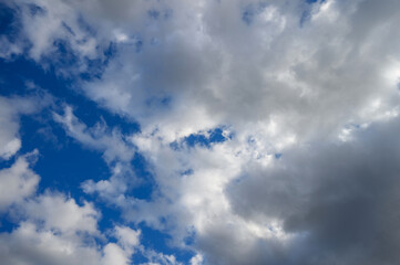 Bright Blue Sky with Fluffy White Clouds