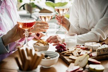 Glasses of rose wine seen during a dinner party of a celebration.