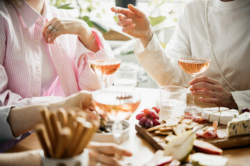 Glasses of rose wine seen during a dinner party of a celebration.