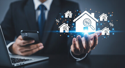 A businessman holding a glowing house icon with a magnifying glass over it, symbolizing real estate analysis and investment.