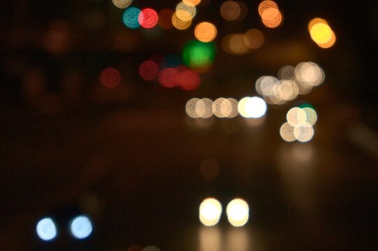 Abstract bokeh lights of city traffic at night - Powered by Adobe