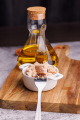 Tin can of tuna in oil with silver lid open