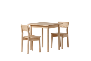Wooden kids' table and two chairs against a solid dark backdrop