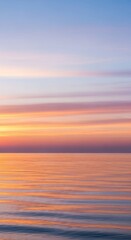 Obraz premium Serene seascape during sundown evokes tranquility with blended pastel color palette creating