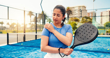 Athlete, woman and shoulder pain on padel court from fitness, match accident and muscle sprain....
