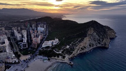 photographer captures sunset at scenic seaside haven with calm waters and coastal architecture - Powered by Adobe