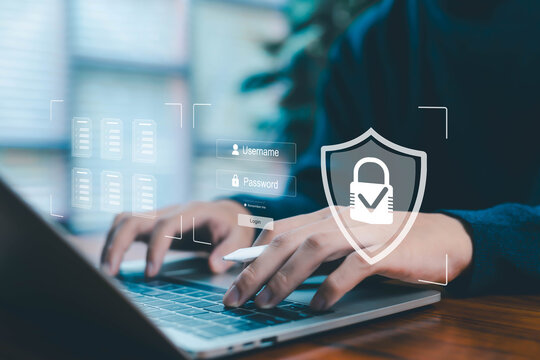 Business person using laptop with digital security interface showing login form, password protection, and data shield icon representing cybersecurity, privacy protection, secure access, and online - Powered by Adobe
