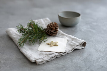 handcrafted christmas card rests elegantly on linen napkin embodying essence of holiday magic