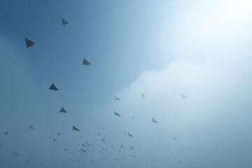 Obraz premium stealth military drones designed in shape of birds patrol border with advanced invisibility technology