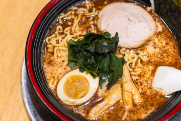 Japanese pork tonkotsu ramen with egg and vegetables