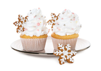 Tasty cupcakes with Christmas decor isolated on white