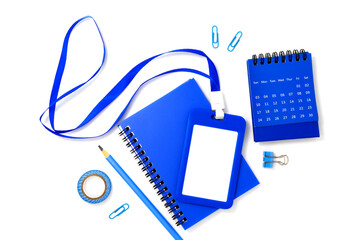 Blue plastic badge with book and calendar isolated on white background. Template designed for employees and guests of company