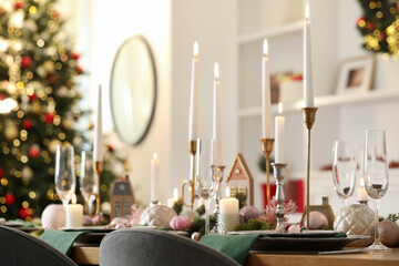 Festive table setting with Christmas decor at home, closeup
