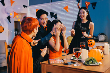 Joyful office Halloween party with coworkers in costumes, celebrating with drinks and laughter, fostering teamwork and festive spirit