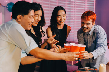 Diversity, dinner and group of people toast celebration together at party. Friends, happy and celebrate with food, wine and friendship for love, support and cheers champagne at business function