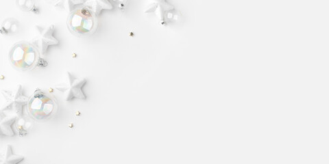 Festive Christmas ornaments on a white background.