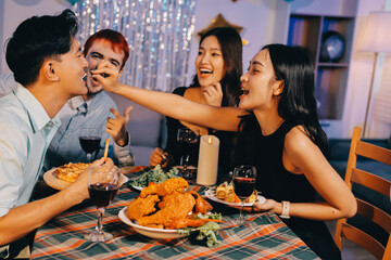 Diversity, dinner and group of people toast celebration together at party. Friends, happy and celebrate with food, wine and friendship for love, support and cheers champagne at business function