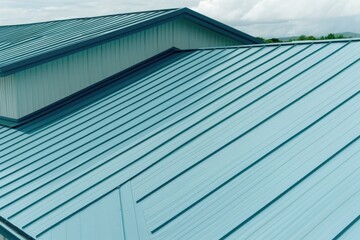 Light blue steel roof with focused side edges, sleek lines, modern design and clear sky background for architectural and construction use