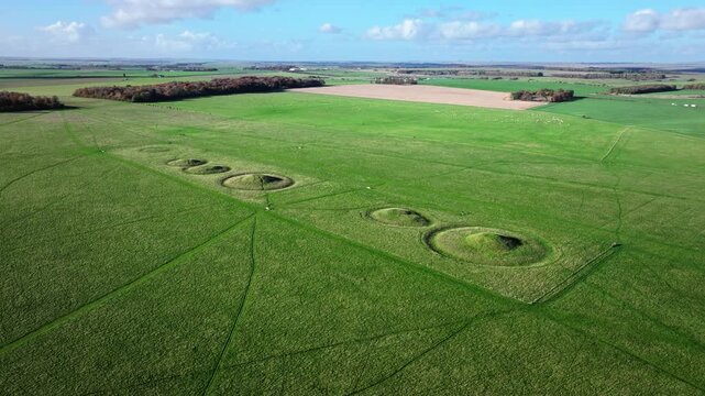 Aerial shot of the Cursus Burial Mounds near Stonehenge, Wiltshire, UK