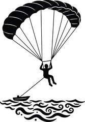 Parasailing person silhouette over the water