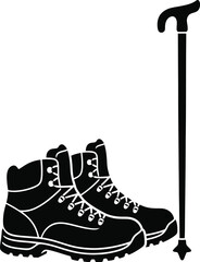 Hiking boots silhouette with walking stick