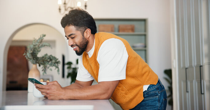Home, cellphone and man with smile, connection and social media with communication. Happy, smartphone and person with email notification, funny meme and texting with network and online reading - Powered by Adobe