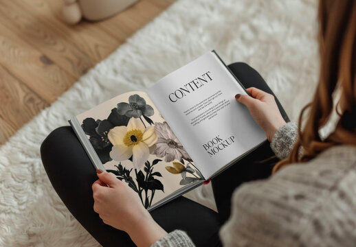 Person Reading Floral Book Mockup PSD