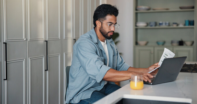 Home, paperwork and man with laptop, typing and writer with royalty statement, filing or calculation. Creative, author and person with document for self employment tax, online and financial analysis