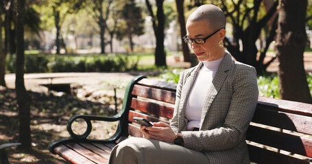 Phone, typing and business woman in park for communication, social media and search. Commute, networking app and connection with person and mobile outdoor for professional, contact and scroll