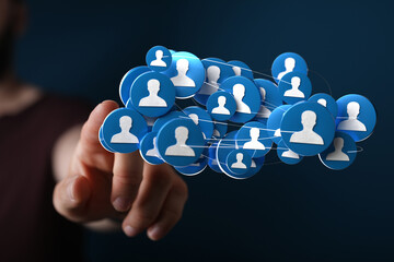 Abstract concept of online connection, social network, community, networking. Person touching a digital network of people.