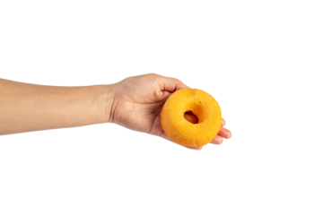Yellow round donut in hand on transparent background
