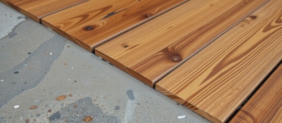 Wooden planks meet concrete in a seamless, modern flooring design.