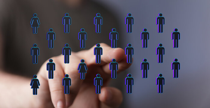 Hand pointing towards digital human icons. Represents connection, communication, and networking in the digital