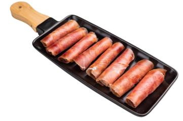 rolled Jamon/Prosciutto slices. Clean and simple isolated food ingredient for recipe design.