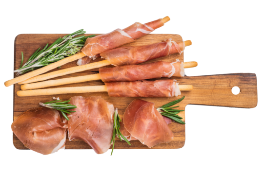 Italian Prosciutto Crudo and Grissini (breadsticks) on a wooden board, garnished with fresh rosemary. Classic antipasto starter.