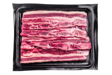 Raw Flanken cut beef short ribs (Kalbi/Galbi) packaged in a black plastic tray for retail sale in a supermarket.