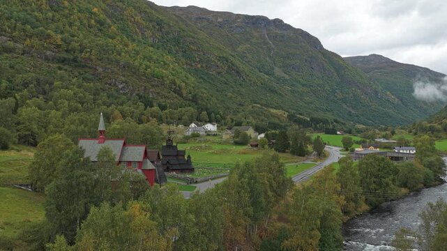 Drone view of Borgund Stave Church showcasing historic wooden design in scenic Norway