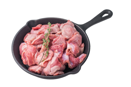 Fresh poultry offal in a black pan with a touch of thyme, stark white background highlights the product