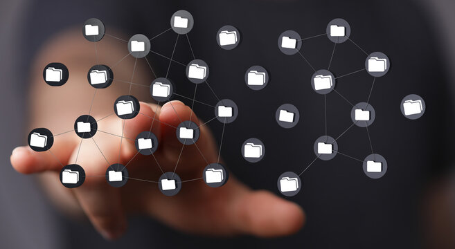 Hand touching digital folders concept. Modern network and data storage connection. Innovative technologies and